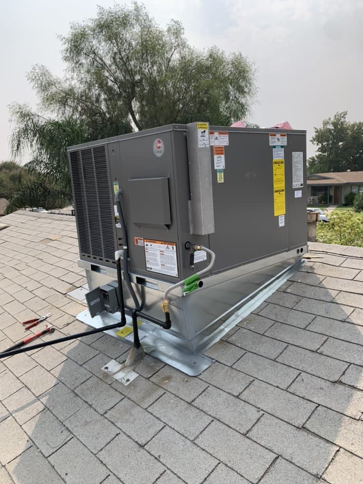 Rooftop heating and cooling equipment at a Kern County property